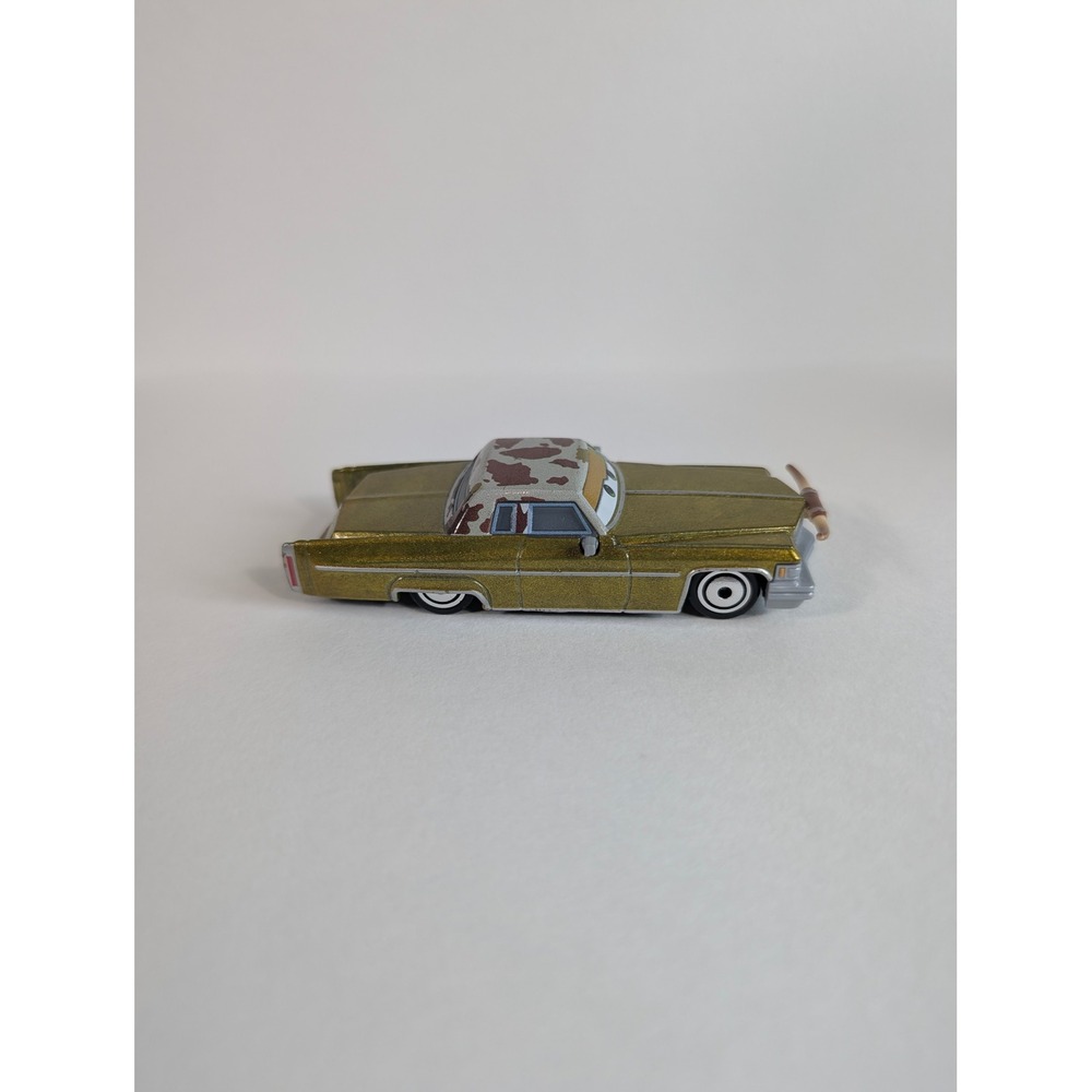 Disney Pixar Cars Tex Dinoco Gold Cadillac Diecast Toy Car Longhorns Mattel - Picture 5 of 8